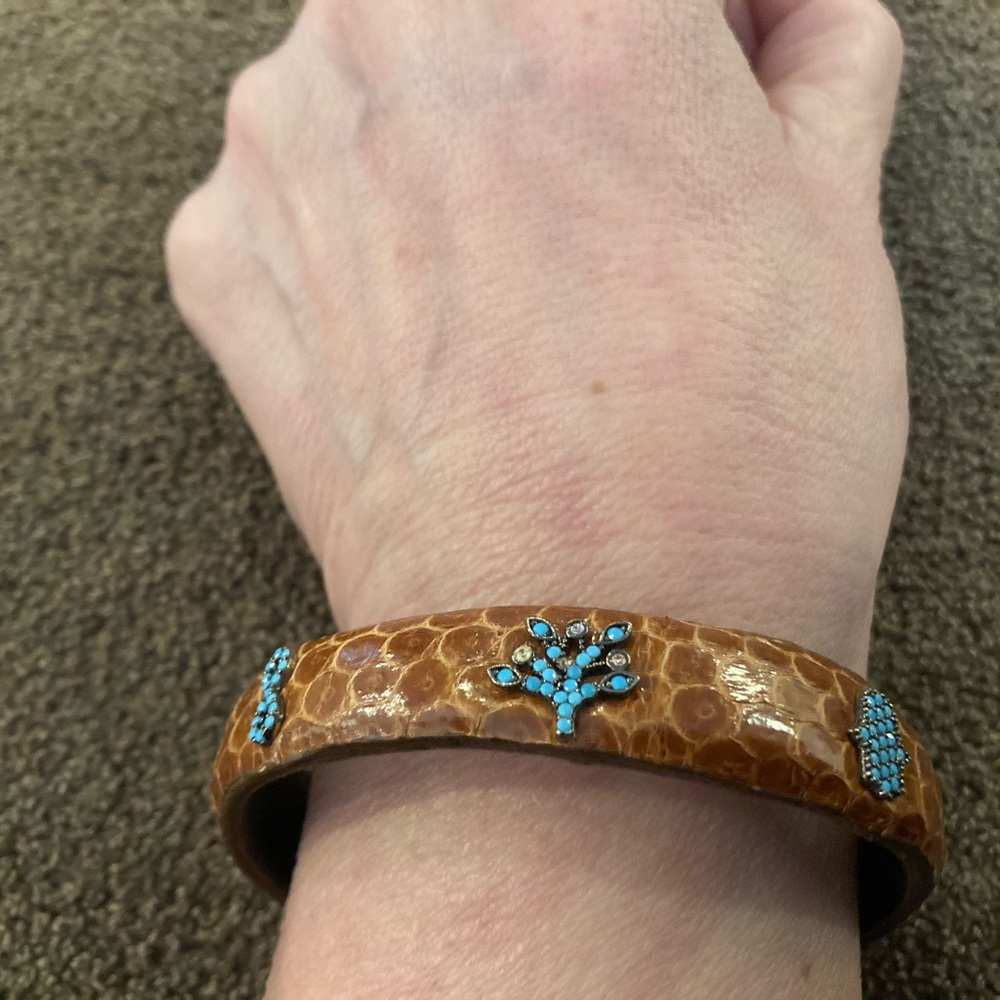 Brown Leather cuff Bracelet with Turquoise hamsa, infinity, and tree Accents.